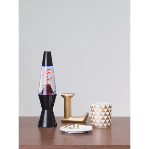10” liquid motion® Lamp Volcano – Black Base - Lifestyle on display table